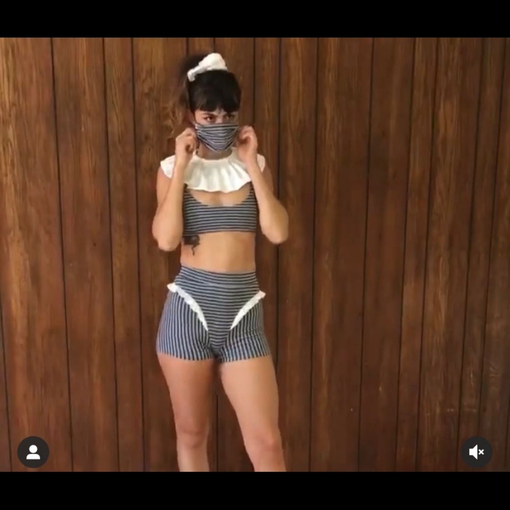 Fashion brand company Penelope Ganzin striped thong shorts